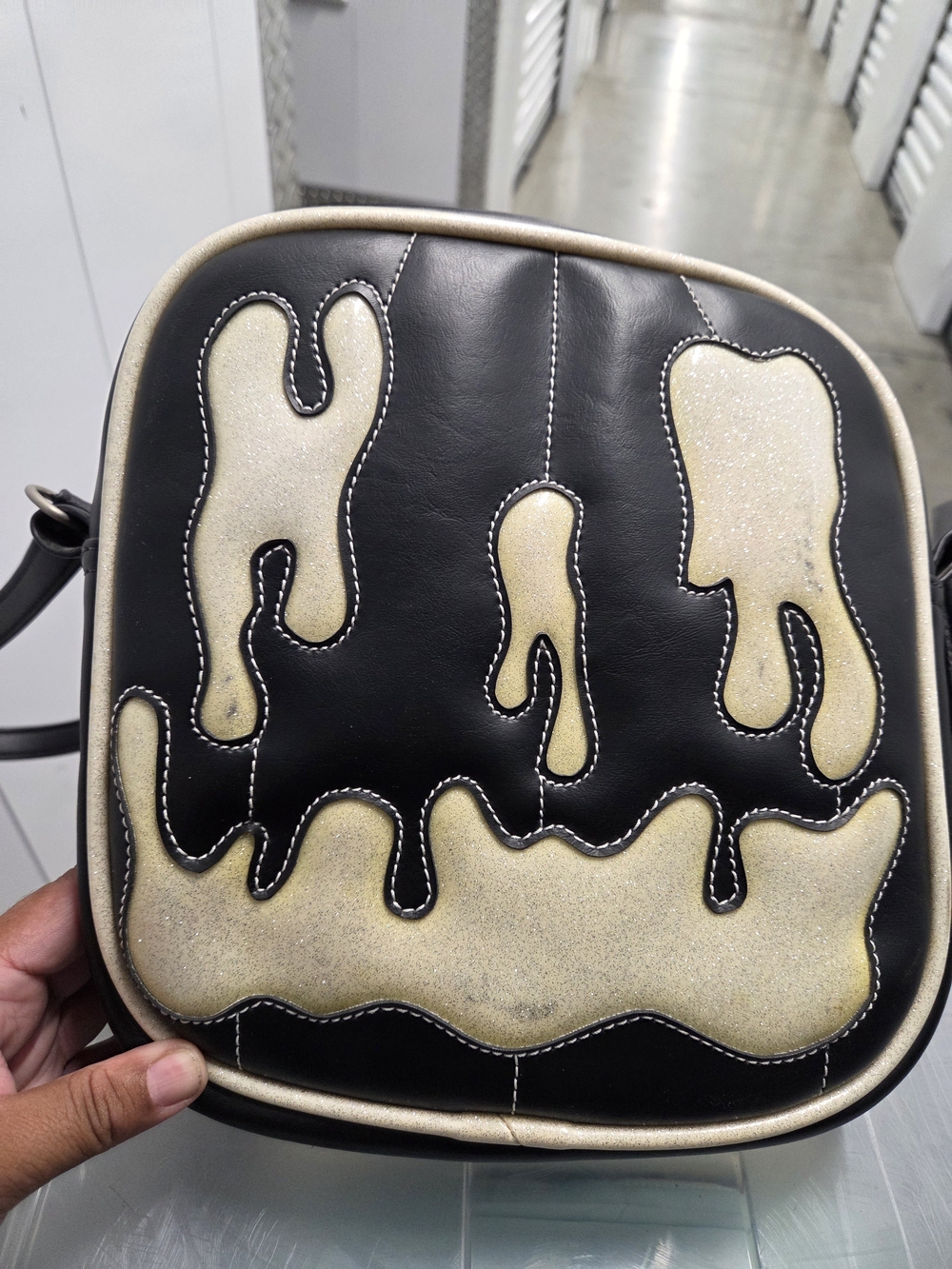 Love Pain& Stiches Black Crossbody W/ Shimmer Drip Face *Stained/ Yellowing*